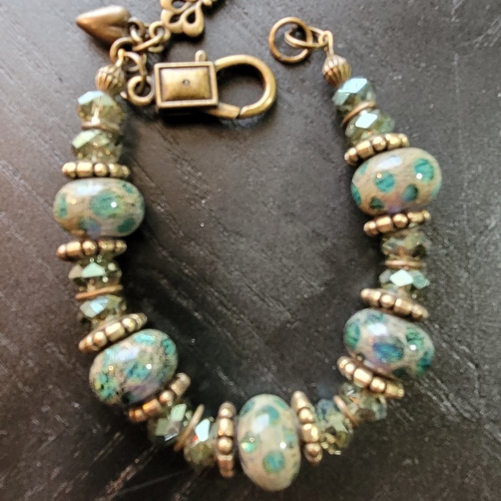 Antique Gold Bracelet with Glass and Crystal Beads with Gold Tone Spacers.